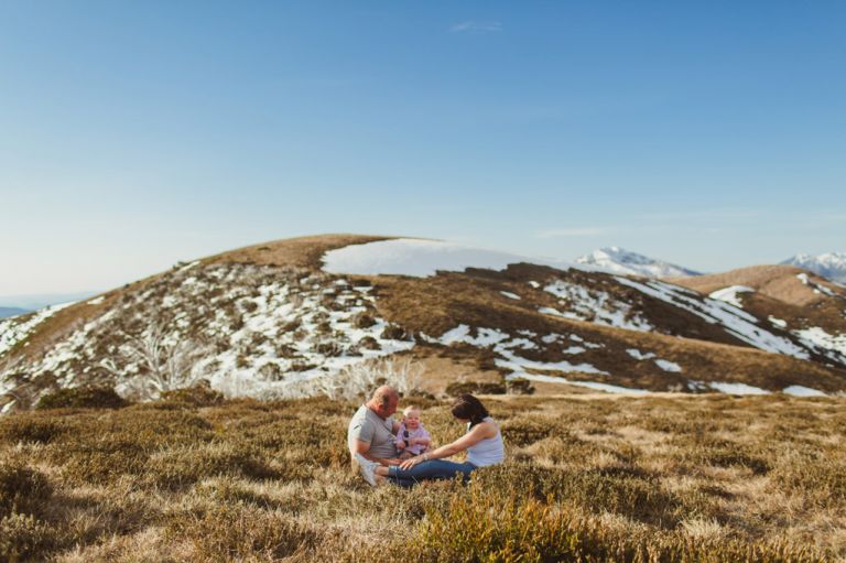 lifestyle family portrait session snowy mountains epic scenery