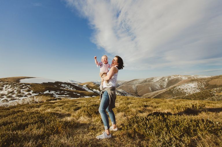 lifestyle family portrait session on a mountain top
