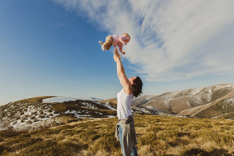lifestyle family portrait session on a mountain top