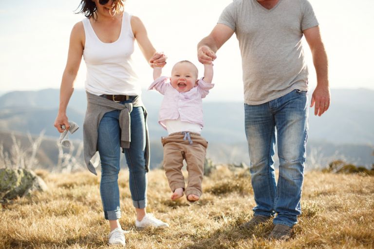 lifestyle family portrait session on a mountain top