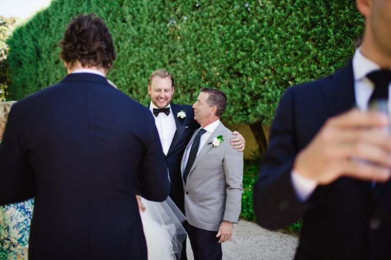 Groom with father of the bride candid moments
